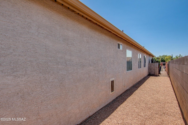 6075 N Applesauce Ct, Tucson, AZ 85741 - view of home's exterior with stucco siding