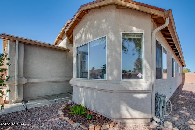 6075 N Applesauce Ct, Tucson, AZ 85741 - view of property exterior featuring stucco siding