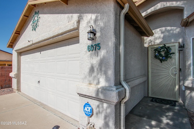 6075 N Applesauce Ct, Tucson, AZ 85741 - entrance to property with stucco siding and a garage