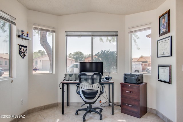 6075 N Applesauce Ct, Tucson, AZ 85741 - office space featuring a textured ceiling and light tile patterned floors
