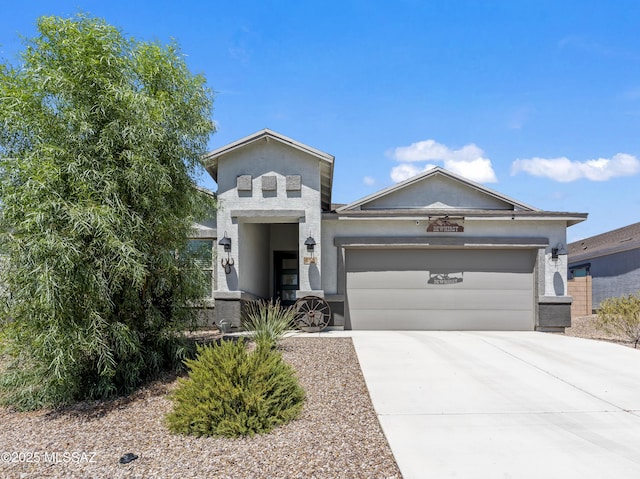 656 W Wilkinson St, Corona De Tucson, AZ 85641 - view of front facade with a garage, driveway, and stucco siding
