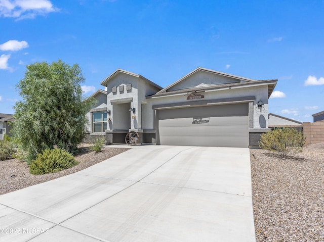 656 W Wilkinson St, Corona De Tucson, AZ 85641 - ranch-style home featuring an attached garage, concrete driveway, and stucco siding