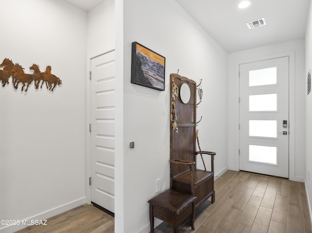 656 W Wilkinson St, Corona De Tucson, AZ 85641 - entrance foyer with wood finished floors and recessed lighting