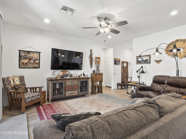 656 W Wilkinson St, Corona De Tucson, AZ 85641 - living room with ceiling fan, wood finished floors, and recessed lighting