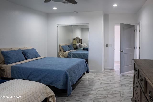 5051 N Hillcrest Dr, Tucson, AZ 85704 - bedroom with light marble finish flooring, recessed lighting, a closet, and a ceiling fan