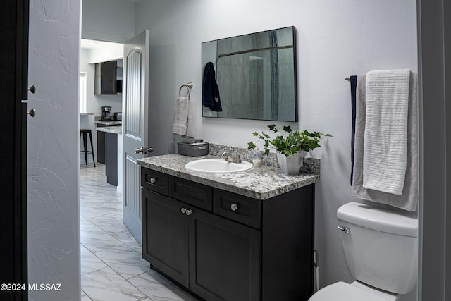 5051 N Hillcrest Dr, Tucson, AZ 85704 - bathroom with vanity and marble finish floors