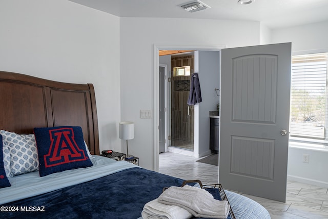 5051 N Hillcrest Dr, Tucson, AZ 85704 - bedroom with light marble finish flooring and baseboards