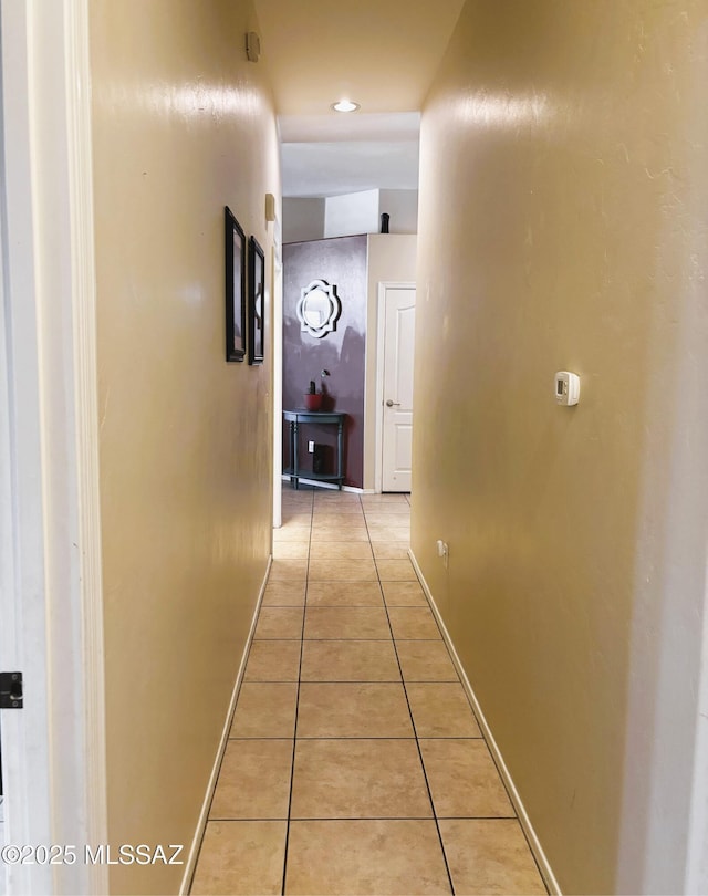 1102 E Mud Spring Canyon Ln, Sahuarita, AZ 85629 - hallway featuring light tile patterned floors and baseboards