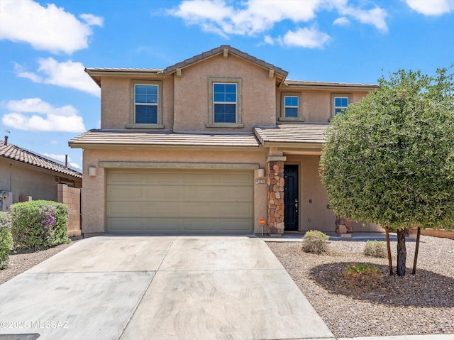 11471 E Squash Blossom Loop, Tucson, AZ 85747 - traditional home featuring concrete driveway, a tile roof, stucco siding, and an attached garage