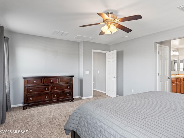 11471 E Squash Blossom Loop, Tucson, AZ 85747 - bedroom featuring carpet, a ceiling fan, and connected bathroom