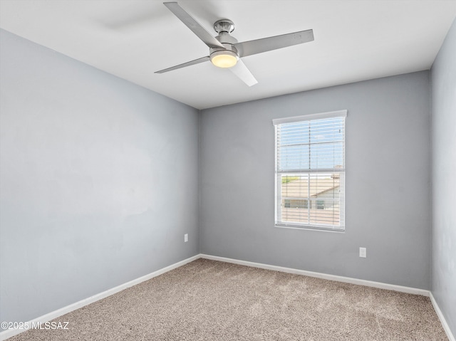 11471 E Squash Blossom Loop, Tucson, AZ 85747 - empty room with ceiling fan and carpet