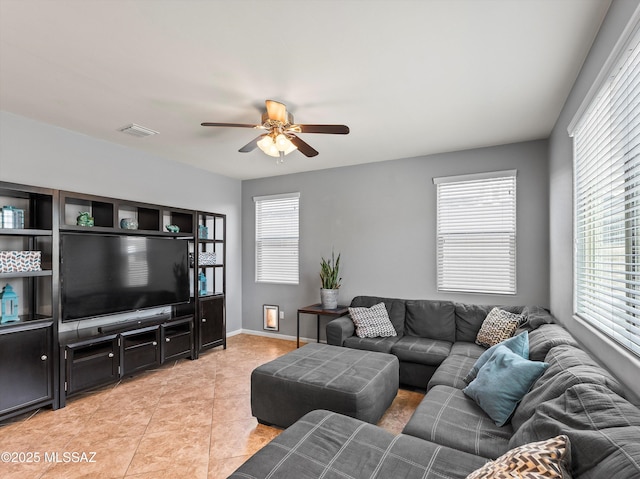 11471 E Squash Blossom Loop, Tucson, AZ 85747 - living area with a ceiling fan and light tile patterned floors