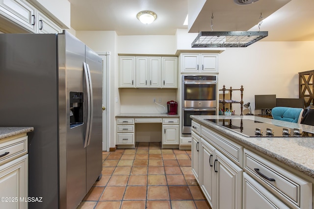 2000 E Campbell Ter, Tucson, AZ 85718 - kitchen featuring stainless steel appliances, an office area, and light tile patterned floors