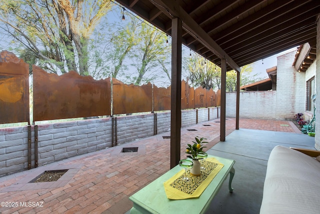 2000 E Campbell Ter, Tucson, AZ 85718 - fenced backyard with a patio area