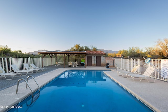 2000 E Campbell Ter, Tucson, AZ 85718 - community pool featuring a patio and a mountain view