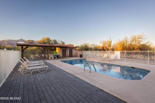 2000 E Campbell Ter, Tucson, AZ 85718 - view of swimming pool featuring a wooden deck