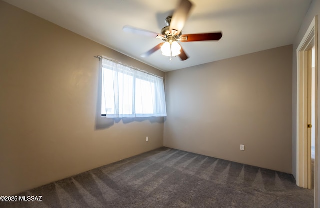 2990 W Trevi Pl Unit 200, Tucson, AZ 85741 - unfurnished room with dark colored carpet and a ceiling fan