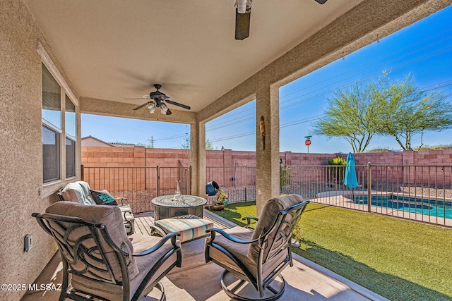 10235 E Placita De Dos Pesos, Tucson, AZ 85730 - fenced backyard featuring ceiling fan and a patio area