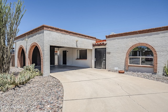 2366 N Camino Mateo, Tucson, AZ 85745 - mediterranean / spanish-style house featuring driveway and stucco siding