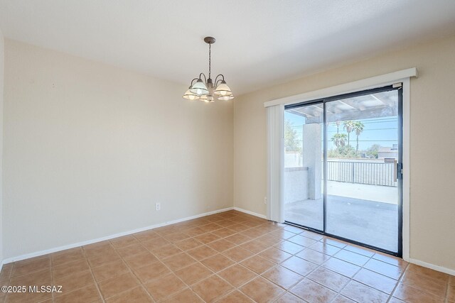 2366 N Camino Mateo, Tucson, AZ 85745 - empty room featuring a chandelier and light tile patterned floors