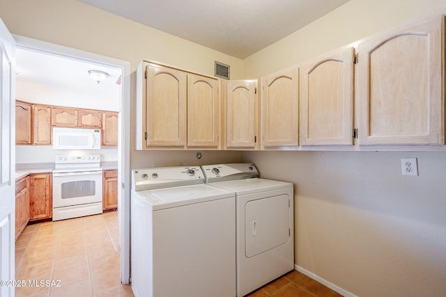 2366 N Camino Mateo, Tucson, AZ 85745 - washroom with washing machine and clothes dryer, cabinet space, and light tile patterned floors