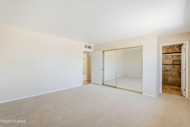 2366 N Camino Mateo, Tucson, AZ 85745 - unfurnished bedroom featuring carpet floors and a closet