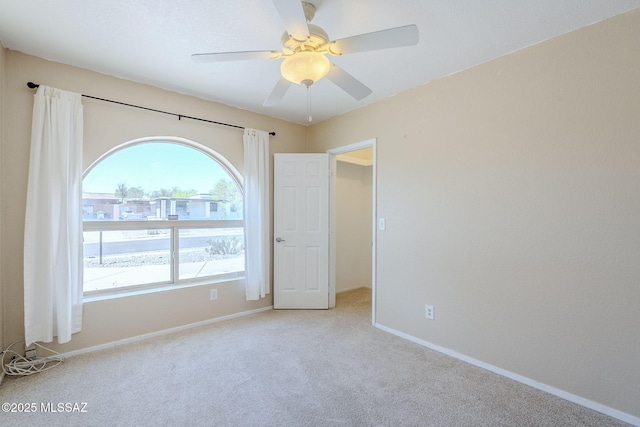 2366 N Camino Mateo, Tucson, AZ 85745 - unfurnished room with carpet floors and a ceiling fan