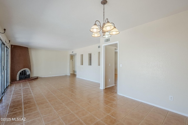 2366 N Camino Mateo, Tucson, AZ 85745 - unfurnished living room featuring a chandelier, a large fireplace, and light tile patterned floors