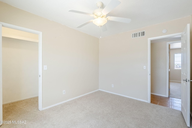 2366 N Camino Mateo, Tucson, AZ 85745 - unfurnished bedroom with carpet and a ceiling fan