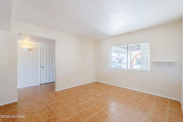 2366 N Camino Mateo, Tucson, AZ 85745 - spare room with baseboards