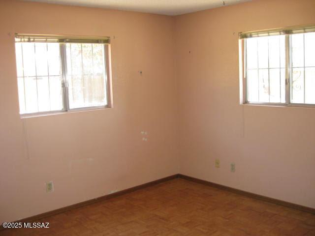 3885 W Mars St, Tucson, AZ 85741 - spare room featuring baseboards
