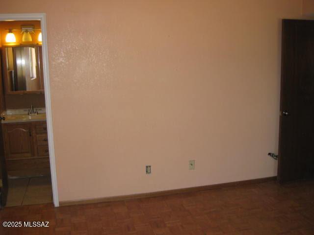 3885 W Mars St, Tucson, AZ 85741 - spare room featuring baseboards