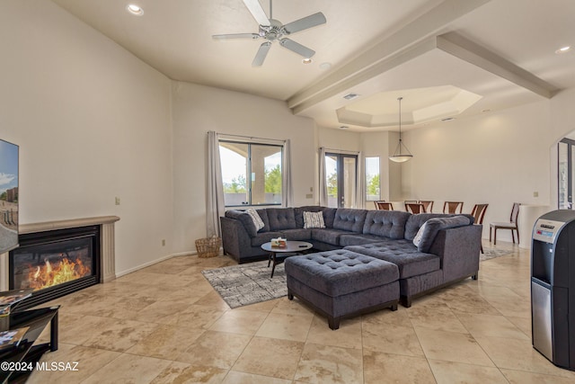 6859 N Placita Chula Vis, Tucson, AZ 85704 - living area with a glass covered fireplace, ceiling fan, recessed lighting, and arched walkways