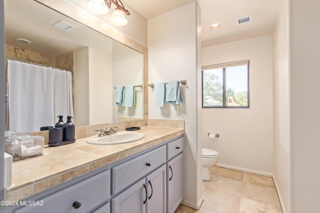 6859 N Placita Chula Vis, Tucson, AZ 85704 - bathroom with toilet and vanity