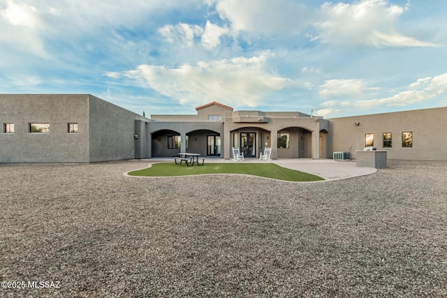 6859 N Placita Chula Vis, Tucson, AZ 85704 - rear view of house featuring stucco siding and a patio
