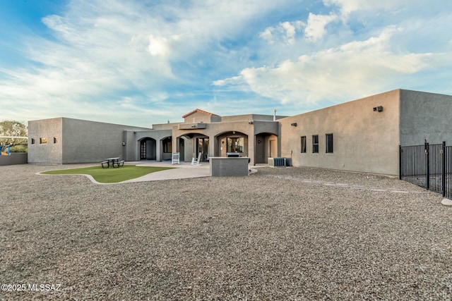 6859 N Placita Chula Vis, Tucson, AZ 85704 - back of property featuring stucco siding and a patio area