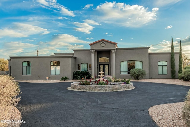 6859 N Placita Chula Vis, Tucson, AZ 85704 - view of front of home with curved driveway and stucco siding