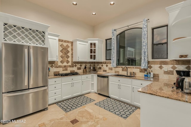 6859 N Placita Chula Vis, Tucson, AZ 85704 - kitchen featuring stainless steel appliances, recessed lighting, tasteful backsplash, white cabinetry, and light stone countertops