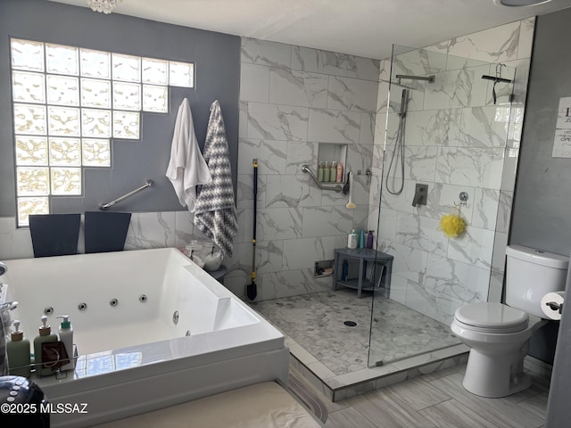 7855 N Northern Ave, Tucson, AZ 85704 - bathroom featuring healthy amount of natural light, a tub with jets, a tile shower, and marble finish floors