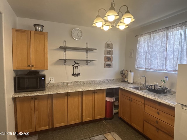 7855 N Northern Ave, Tucson, AZ 85704 - kitchen featuring open shelves, a chandelier, freestanding refrigerator, hanging light fixtures, and light stone countertops