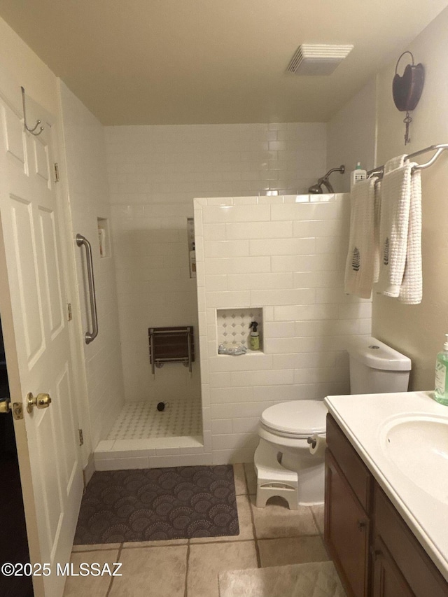 7855 N Northern Ave, Tucson, AZ 85704 - full bath featuring a shower stall, vanity, and tile patterned floors