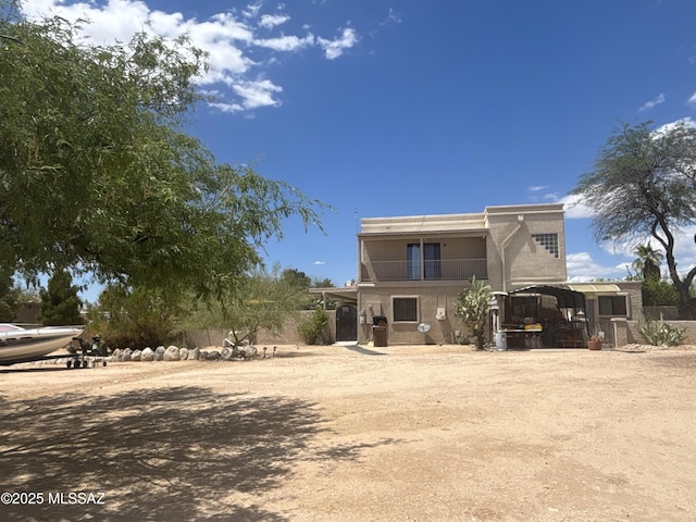 7855 N Northern Ave, Tucson, AZ 85704 - rear view of house featuring a balcony