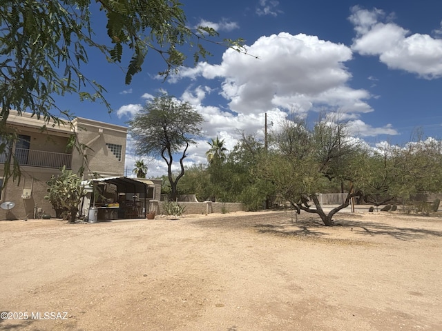 7855 N Northern Ave, Tucson, AZ 85704 - view of yard featuring a carport