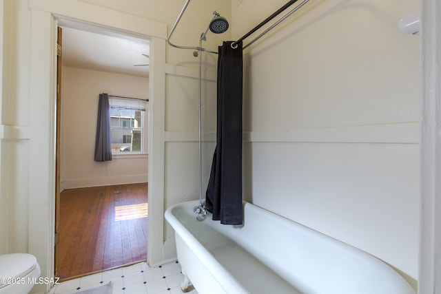 642 E 2nd St, Tucson, AZ 85705 - bathroom featuring toilet and hardwood / wood-style floors