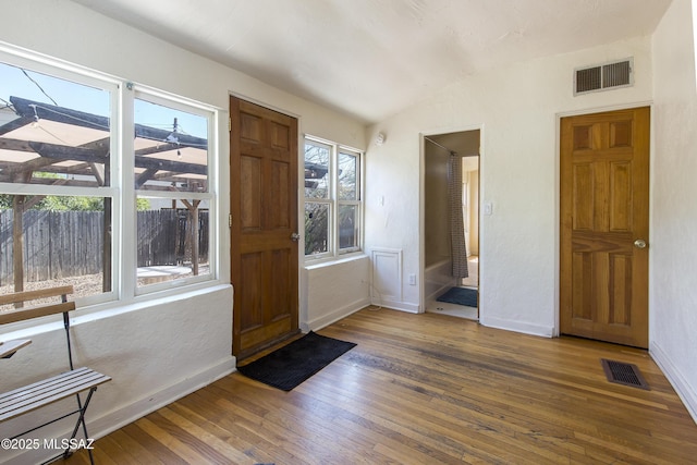642 E 2nd St, Tucson, AZ 85705 - foyer entrance featuring lofted ceiling and wood-type flooring
