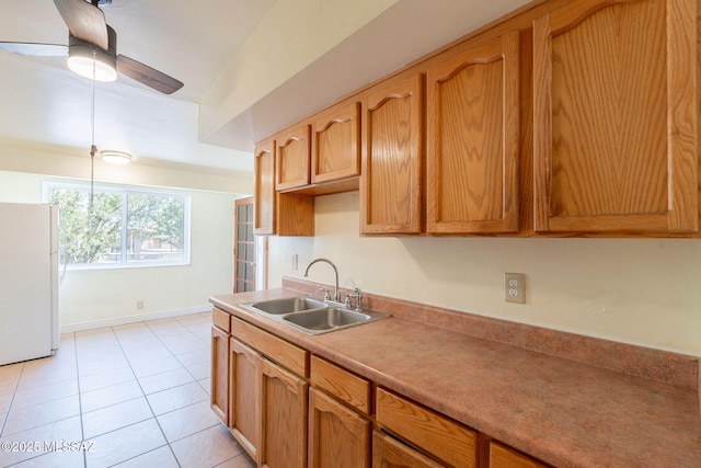325 W Santa Maria St, Tucson, AZ 85706 - kitchen with freestanding refrigerator, a ceiling fan, light tile patterned floors, light countertops, and decorative light fixtures