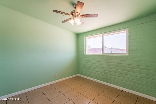 325 W Santa Maria St, Tucson, AZ 85706 - spare room featuring light tile patterned flooring and a ceiling fan