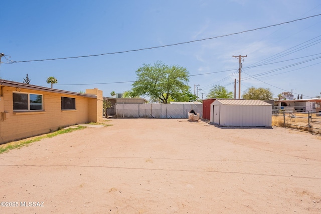 325 W Santa Maria St, Tucson, AZ 85706 - view of yard featuring a storage unit