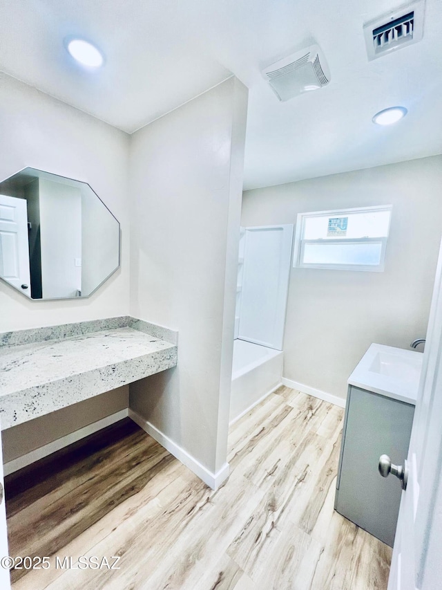 1105 S 1st Ave, Safford, AZ 85546 - full bathroom featuring vanity and wood finished floors