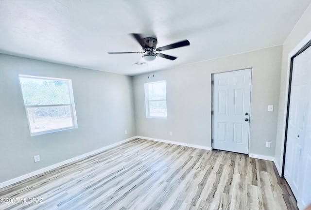 1105 S 1st Ave, Safford, AZ 85546 - spare room featuring light wood-style floors and ceiling fan